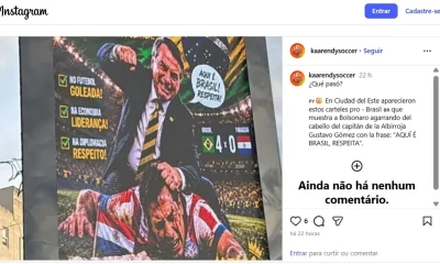 Flávio Bolsonaro repudia "uso criminoso" de imagem do pai em painel no Paraguai
