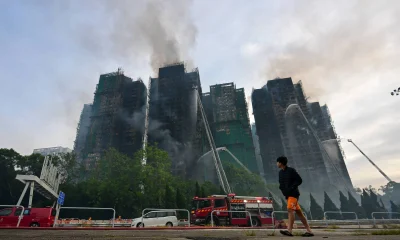 Incêndio em prédio residencial em Hong Kong: Corpos são encontrados em telhados e número de mortos chega a 146