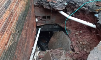 Homem é arrastado por enxurrada e desaparece em galeria pluvial em Sabará, na Grande BH; bombeiros em buscas